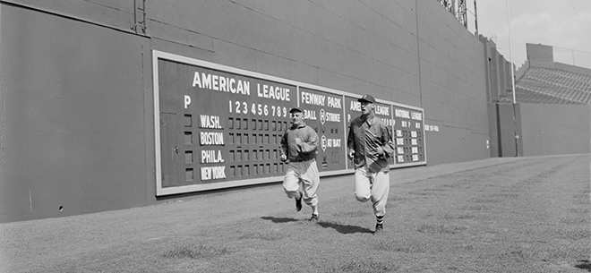 The Fascinating History (& Secrets) of Fenway Park's Iconic Green Monster  - FanBuzz